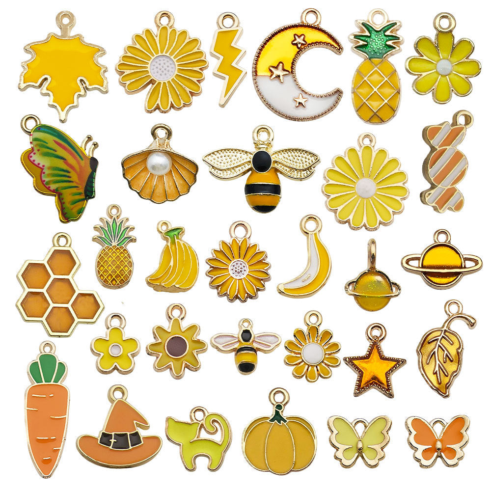 C-7- Yellow mixed charms 30 psc