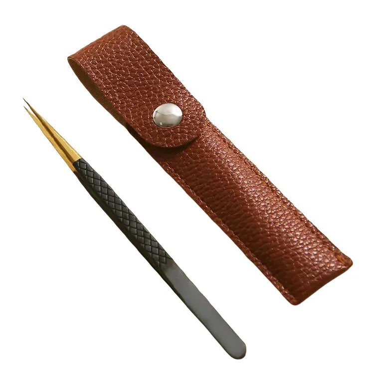 Black gold tweezers with leather case